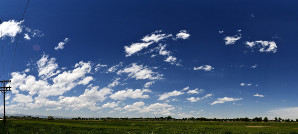 Mid Afternoon Spring Fluffy Clouds