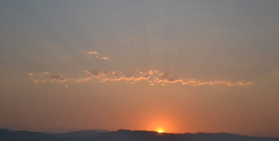 Lonely Clouds in an Orange Sunset