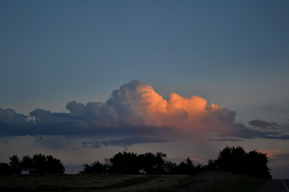 Pink Cumulus Clouds at Sunset