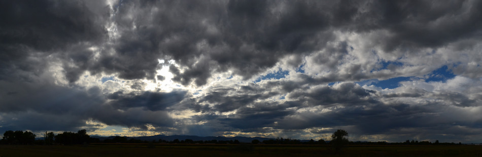 Panoramic Afternoon Stormy Clouds with Crepuscular Rays