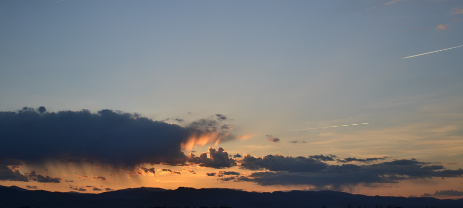 Orange Sunset with Small Rain Clouds