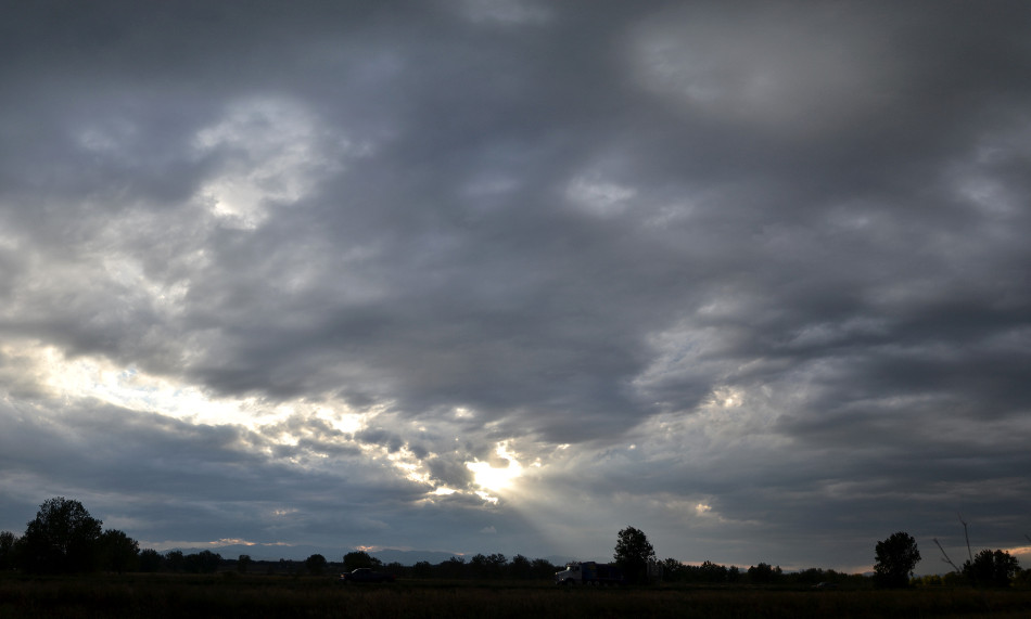 God's Rays Through Stormy Clouds